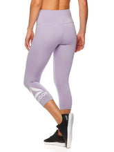 Load image into Gallery viewer, Reebok Women&#39;s Wanderlust Highrise Capri Leggings
